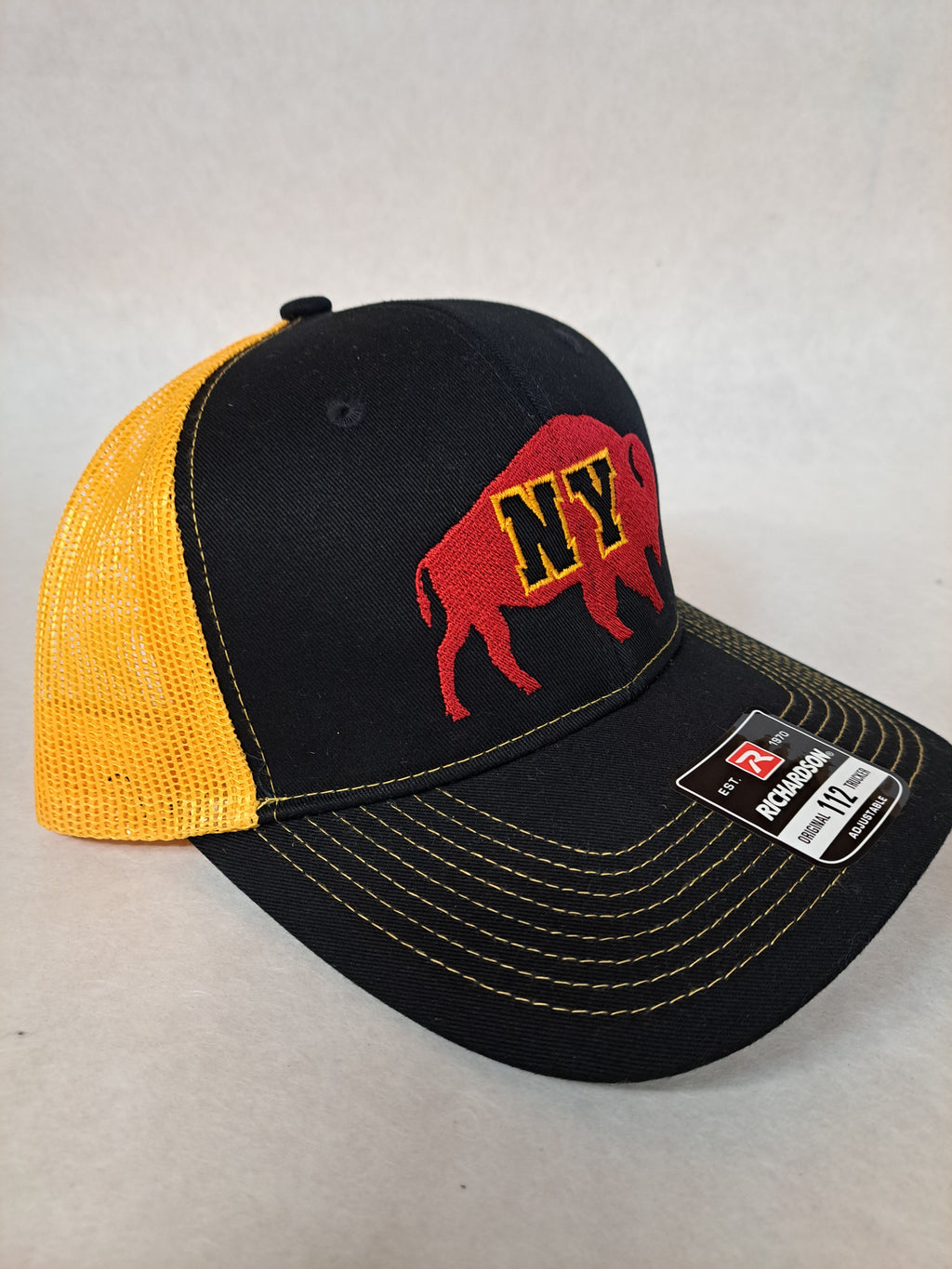NY on a Buffalo. Black and Yellow Richardson Hat