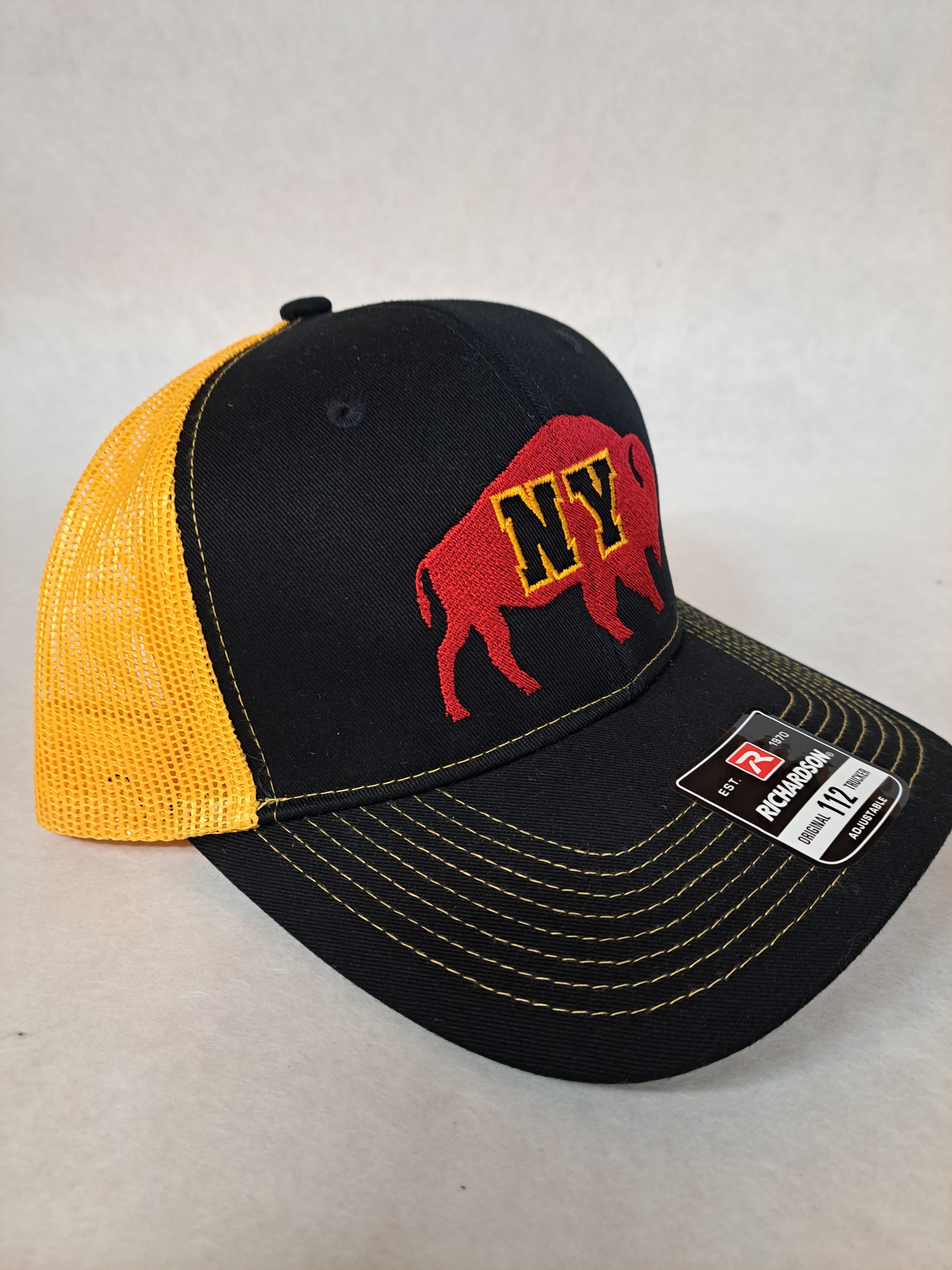 NY on a Buffalo. Black and Yellow Richardson Hat